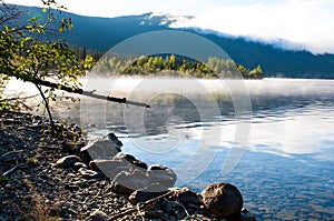 Early sunny morning impression  on the lake shore on Quiete Lake, Yukon