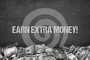 Earn extra money text on black background