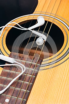 Earphone on guitar,selective focus