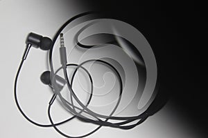 Earphones cable under lighting