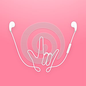 Earphones wireless and remote, earbud type white color and I Love You hand sign language made from cable isolated on pink