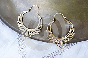 Earring on natural neutral background