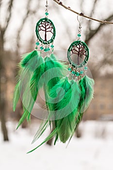 earrings of Dream catcher with feathers threads and beads rope hanging. Dreamcatcher handmade