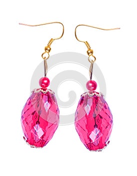 Earrings in light-cherry glass with gold elements. white background photo