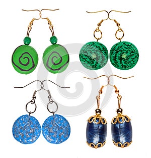 Earrings made of plastic and glass on a white background blue an