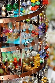 Earrings on a market stall