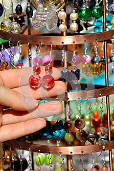 Earrings on a market stall