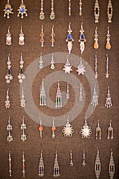 Earrings on a market stall