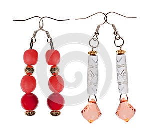 Earrings- pendants with sequins and red beads on white background