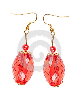 Earrings in red glass with gold elements. white background