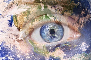 Earth awakening concept, save the planet. Close up image of woman face with earth painted. Creative composite of macro photo