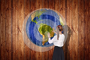 Earth ball texture on wood background