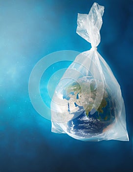Earth blue planet globe wrapped in plastic bag