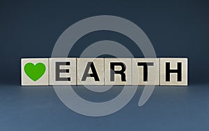 Earth. The cubes form the words Love Earth. The concept of respect for the earth and love for it