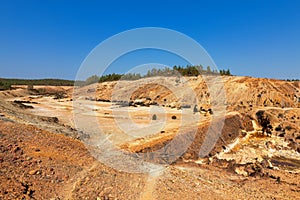 Earth dam wall with an empty dam