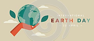 earth day concept with human hand holding planet globe