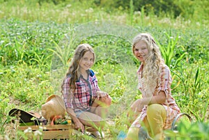 Earth day. summer family farm. happy farming. spring country side. small girls farmer in village garden. protect nature