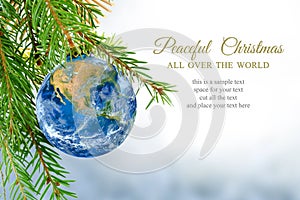 Earth globe as christmas bauble, metaphor for universal peace, e