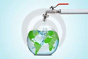 Earth globe with flowing water from a faucet