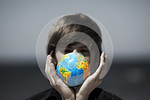 Earth globe in hands. Conceptual image