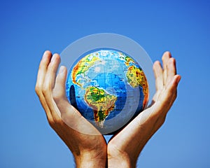 Earth globe in hands. Conceptual image