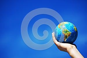 Earth globe in hands. Conceptual image