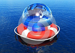 Earth globe in lifebuoy floating in water