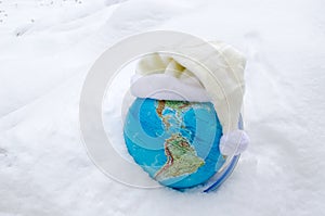 Earth globe sphere snow snowbank white cap concept