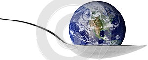 Earth globe in a spoon