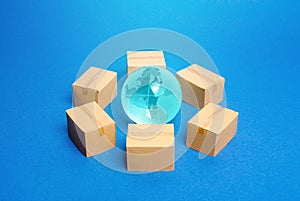 Earth globe is surrounded by boxes. Global business and transportation of goods and products. Shipping and freight, world trade