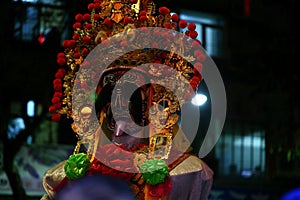 The Earth God parade. The Earth God is believed to protect villages