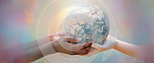 The Earth Held in Hands Symbolizing Unity and Global Care.AI generated image