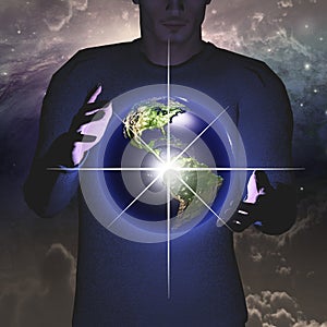 Earth hovers between hands