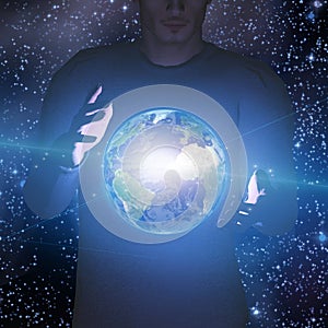 Earth hovers between mans hands