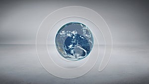 Earth loop spin animation on a studio background