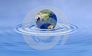Earth planet on water wave ripples