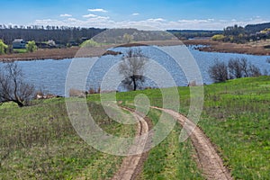 Earth road leading down to Suha Sura river in Vasylivka village near Dnepr city