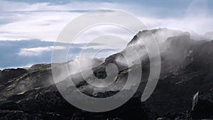 Earth, volcanic activity, Geothermal area , fumaroles volcanic boiling mud pots, Iceland. Smoke on the ground. Global