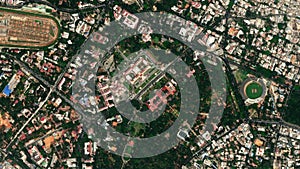 Earth zoom in from space to Bangalore, India in Vidhana Soudha