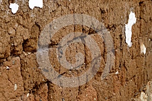 An earthen brick wall in a village near the historic city of Lijiang, Yunnan, China