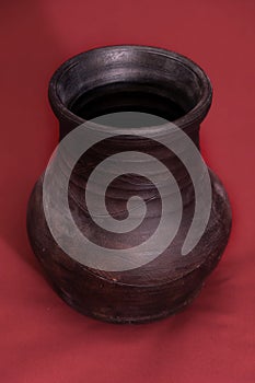 Earthen jar made by hand on pottery wheel