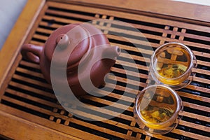 Earthenware teapot with two cups