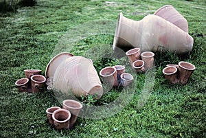 Earthenware water jug and flowerpots