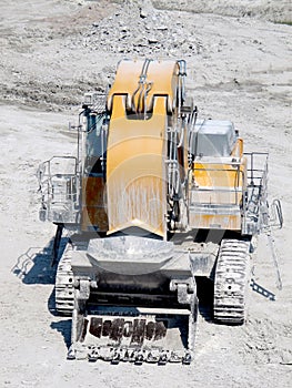 Earthmover in a chalk open pit mine