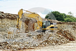 Earthmover in limestone quarry