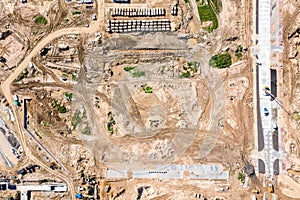 Earthmoving and asphalt pavement works at road construction site. aerial view photo