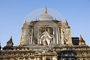 After an earthquake, a damaged old pagoda in Bagan is partially scaffoldes with bamboo