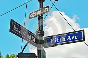 East 42nd St and Fifth avenue street sign in Manhattan New York City