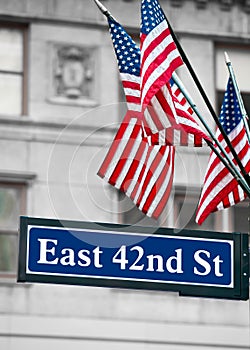 East 42nd Street Signs and US flag