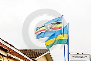East African Community and Rwandan flags on the border between Rwanda and Democratic republic of congo